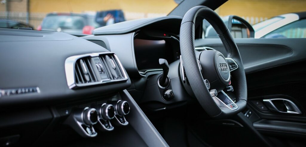 An Audi R8 rental steering wheel