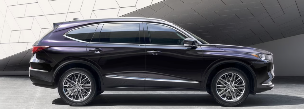 Acura MDX luxury family car sideview.